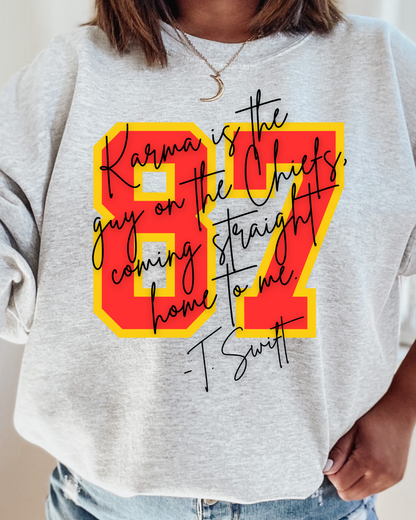 87 Karma Is The Guy On The Chiefs NFL X Taylor Crewneck Pull: X Large / Sandstone